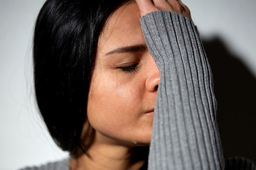 Image showing close up of unhappy crying woman