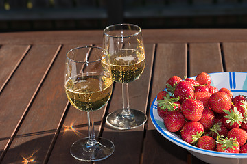 Image showing Fresh strawberries and sparkling wine