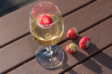 Image showing Fresh strawberry in a glass sparkling wine