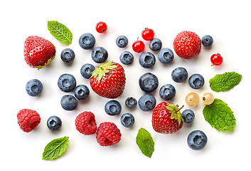 Image showing various fresh berries on white background