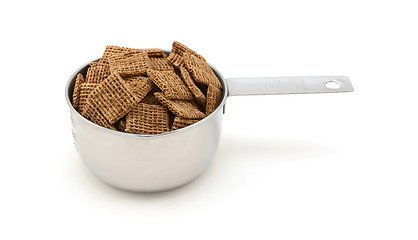 Image showing Malted shredded wheat biscuits breakfast cereal in a measuring c