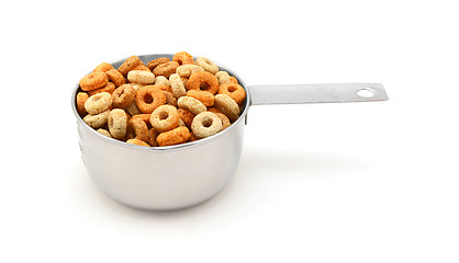 Image showing Multigrain hoops breakfast cereal in a measuring cup