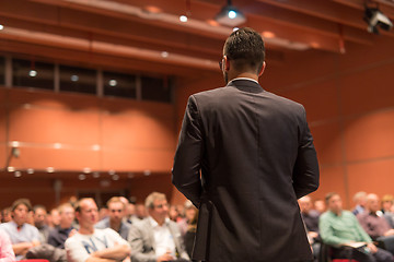 Image showing Public speaker giving talk at Business Event.