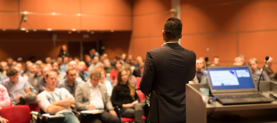 Image showing Public speaker giving talk at Business Event.