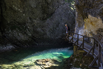 Image showing Woman hiking in Vintgar gorge in Slovenia near lake Bled.