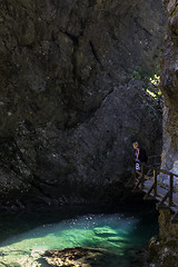 Image showing Woman hiking in Vintgar gorge in Slovenia near lake Bled.