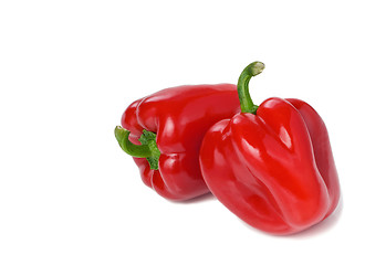 Image showing Pair of Red Bell Peppers On White