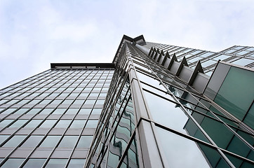 Image showing Modern Steel and Glass Office Building on Gray Day