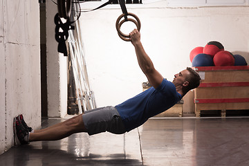 Image showing man doing dipping exercise