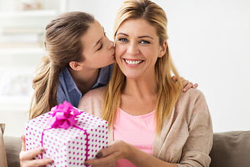 Image showing girl giving birthday present to mother at home