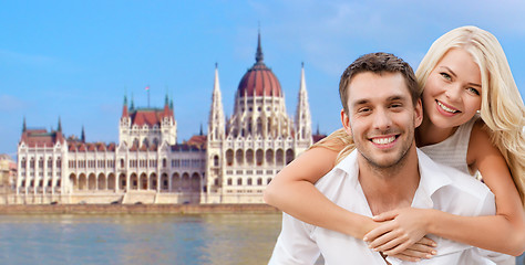 Image showing happy couple over house of parliament in budapest