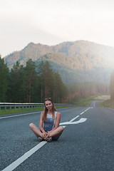 Image showing Woman sitting on the road