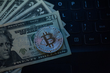 Image showing Bitcoin coin with dollars