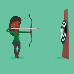 Image showing Archer aiming with bow and arrow at the target.