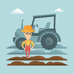 Image showing Farmer standing with tractor on background.