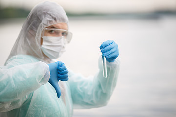 Image showing Photo of biologist in mask