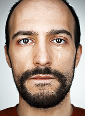 Image showing The crying man with tears on face closeup