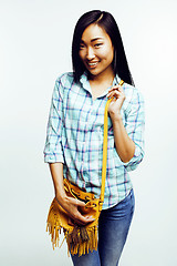 Image showing young pretty asian woman posing cheerful emotional isolated on white background, lifestyle people concept