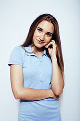 Image showing young pretty teenage hipster girl posing emotional happy smiling on white background, lifestyle people concept