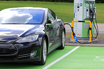 Image showing Black Tesla Model S Electric Car Charging