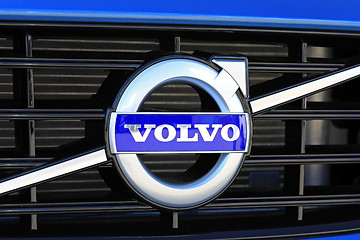 Image showing Sign Volvo on New Blue Car