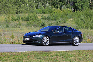 Image showing Tesla Model S Electric Car in Green Scenery