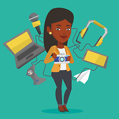 Image showing Young woman surrounded with her gadgets.