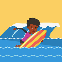 Image showing Happy surfer in action on a surf board.