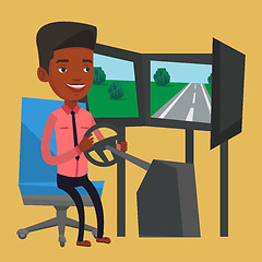 Image showing Man playing video game with gaming wheel.