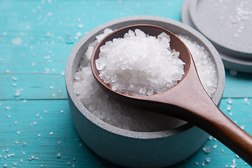 Image showing sea salt in stone bowl and wooden spoon