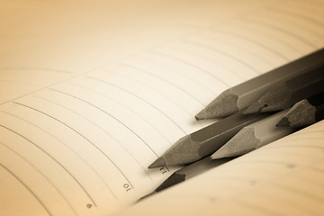 Image showing Color pencil and agenda