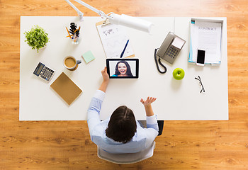 Image showing hands of businesswoman with tablet pc at office