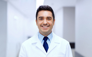 Image showing smiling doctor in white coat at hospital