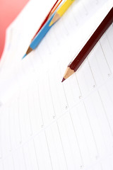 Image showing Color pencil and agenda