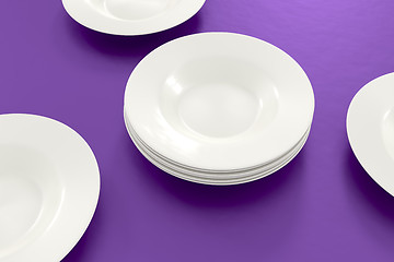 Image showing some plates on the table