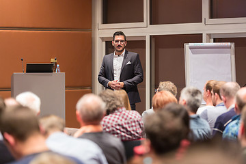 Image showing Business speaker giving a talk at conference meeting.