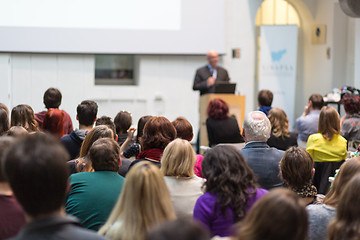 Image showing Man giving presentation in lecture hall at university.