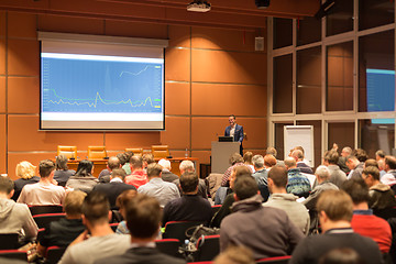 Image showing Business speaker giving a talk at business conference event.