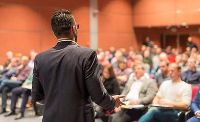 Image showing Public speaker giving talk at Business Event.