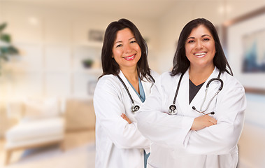 Image showing Female Hispanic Doctors or Nurses Standing in an Office