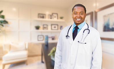 Image showing Young African American Doctor or Nurse Standing in His Office