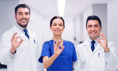 Image showing group of medics at hospital showing ok hand sign