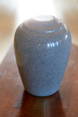 Image showing cremation urn on table