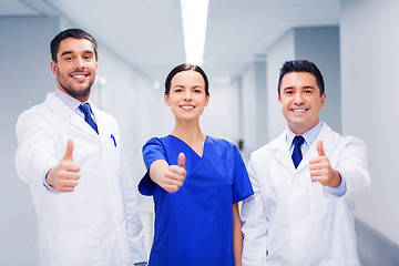 Image showing medics or doctors at hospital showing thumbs up