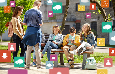 Image showing teenage students with tablet pc at school yard