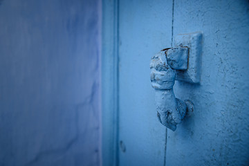 Image showing Knocker in Chefchaouen, the blue city in the Morocco.