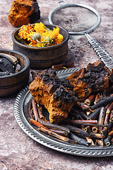 Image showing Healing gathering roots and herb