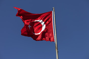 Image showing Sunlight Turkish flag waving in wind at sunny day