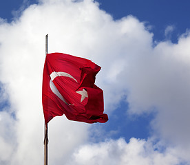 Image showing Turkish flag on flagpole waving in wind