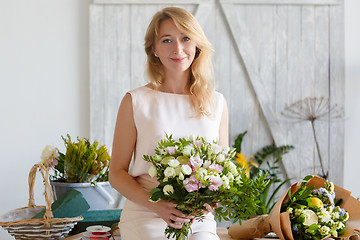 Image showing Image of blonde with bouquet